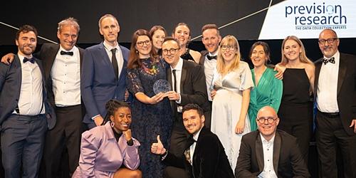 The MTM team collect their award for research live agency of the year at the MRS Awards 2023, pictured with awards host Sophie Duker.